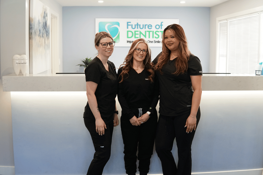 Dental team members at Future of Dentistry in Billerica standing in the office reception area