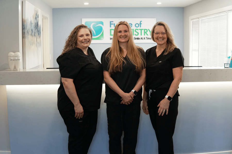 Dental team members at Future of Dentistry in Billerica standing together in the office