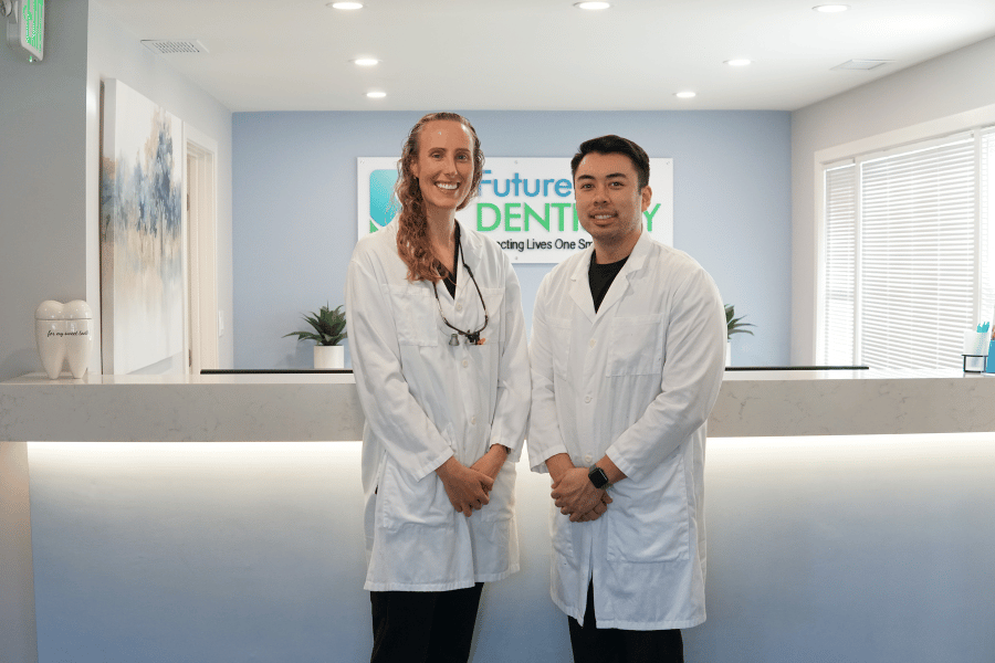 Dr. Ozimek and Dr. Nguyen at Future of Dentistry Billerica standing together in the office reception area